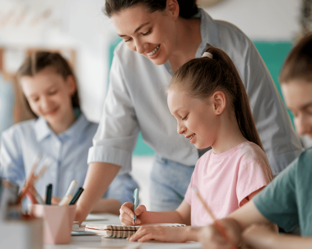 Teacher helping a student with schoolwork